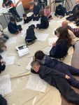 Kids drawing at the Town exhibition by Hands on artists at the Drill Hall Gallery