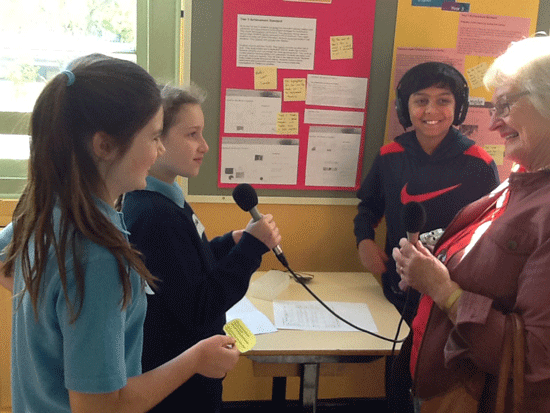 photo of children recording oral histories